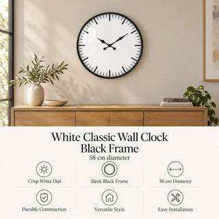 White classic wall clock with black frame 58cm diameter specifications above oak sideboard