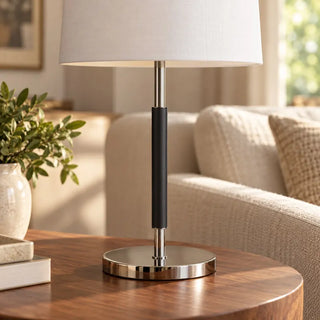 Zagna modern metal table lamp close up of black sleeved chrome stem and round bas