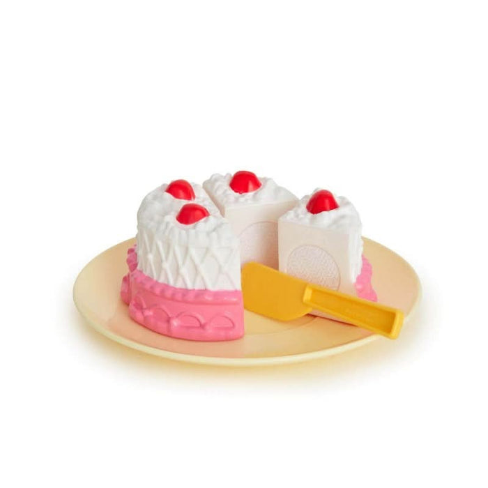 A close-up of a child's hands setting up a tea party, showcasing the vibrant pastel colours of the tea set accessories